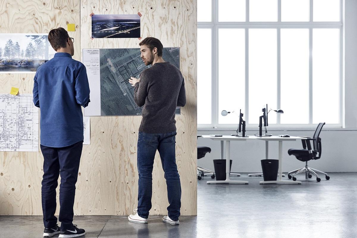 People discussing in a creative office space